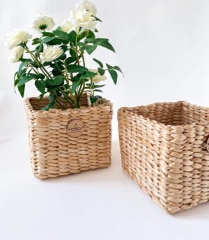 Evara’s artisanal storage basket handcrafted from 100% natural banana fiber, designed with a sturdy woven structure, minimalist aesthetic, and smooth natural finish. Ideal for organizing living spaces, storing linens, toys, or accessories. Lightweight yet durable, with reinforced edges and optional handles for easy mobility. A biodegradable, eco-friendly home décor piece that blends functionality with timeless elegance.